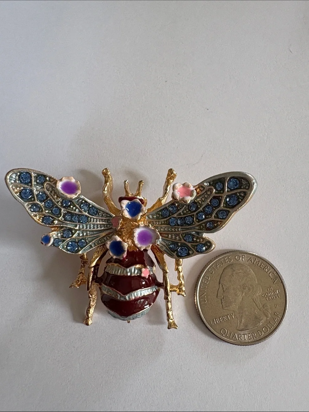 Gold-Tone Bee Brooch with Blue Rhinestones and Purple Enamel Flowers